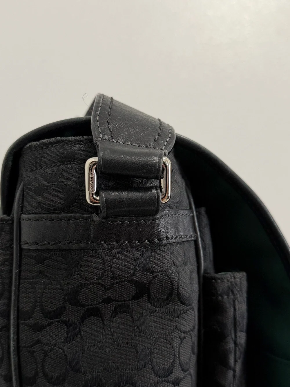 Coach black signature